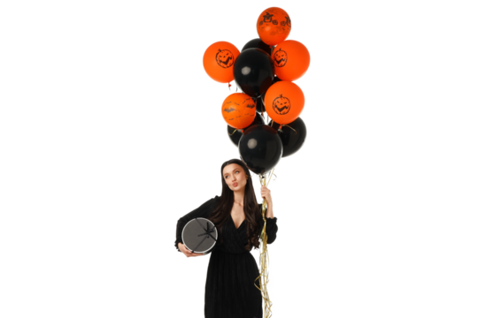 Woman celebrates Halloween with balloons, isolated on white, PNG - Powered by Adobe