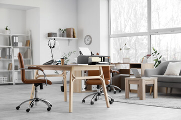 Modern workplace with printer in office interior