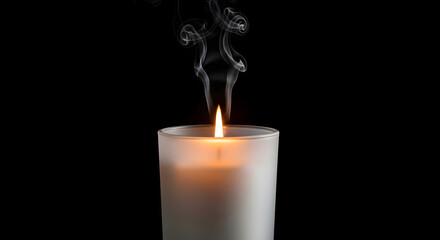 Glowing Candle Flame with Rising Smoke on Black Background