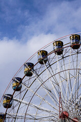 Giant Ferris Wheel Against Blue Sky &ndash; Amusement Park Carnival Ride