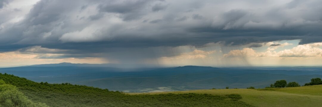 Dramatic storm clouds over rolling green mountains and fields