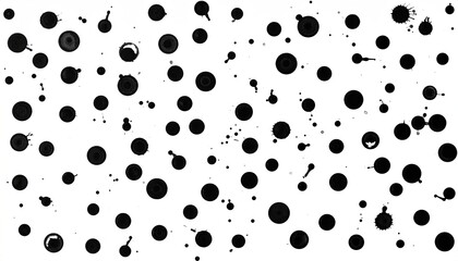 A white background with random black ink blots of varying sizes and shapes scattered across
