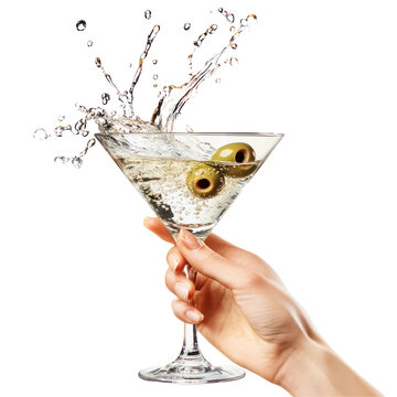 Hand holding martini glass with olives and splash isolated on transparent background