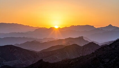 Golden Sunset Over Mountain Ranges with Soft Lighting and Smooth Gradient Sky in Warm Colors