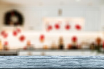 Empty wooden table with blur room background