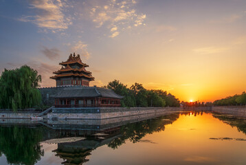 Fototapeta premium Corner Tower of the Forbidden City at sunset
