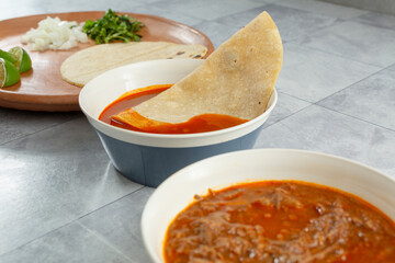 A view of a beef birria taco meal.