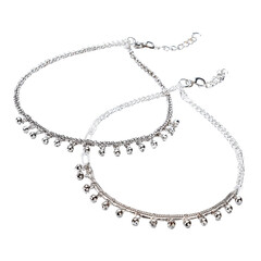 Pair of ornate, silver anklets with small, studded embellishments