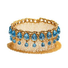 Gold bangle with light blue teardrop crystals