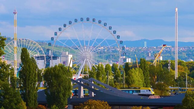 An aeerial Time lapse view around the octoberfest in Germany in stuttgart also known as the cannsttater wasen