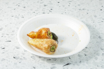 A view of chiles toreados, on a plate.