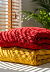 Stacked Knit Sweaters in Warm Sunlight