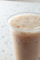 A closeup view of a milk tea drink.