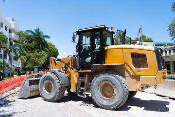 Compact wheel loader. Heavy equipment of compact wheel loader with hydraulic system. Wheel loader heavy machinery. Industrial heavy equipment. Compact wheel loader machinery