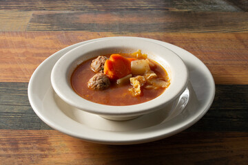 A view of a bowl of albondigas.