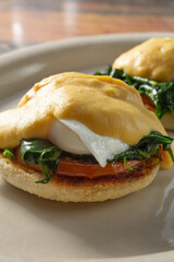 A closeup view of a plate of eggs Florentine.