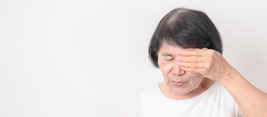 Elderly Woman having Eye pain and Irritation for concepts of Eye disease, Cataract, Glaucoma, Age...