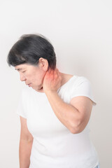 Elderly Woman having Neck pain for concepts of Neck Muscle Strain and Inflammation, Myofascial pain...