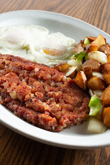 A view of a corned beef hash breakfast plate.