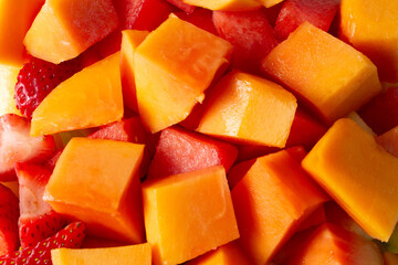 A top down view of a fruit salad, as a background.