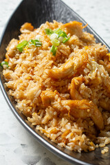 A view of a bowl of arroz chaufa de pollo.