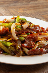 A view of a plate of Mongolian beef.
