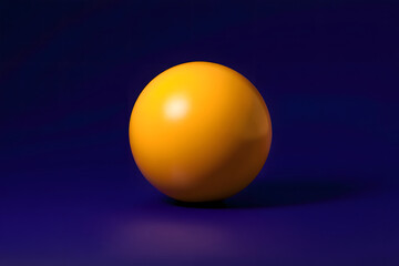 A single yellow sphere centered on a dark blue surface with a subtle reflection and soft lighting