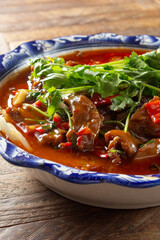A view of a bowl of boiled beef.