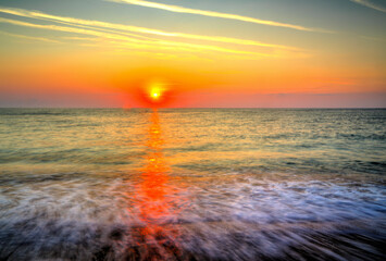 Beautiful summer sunrise over the beach
