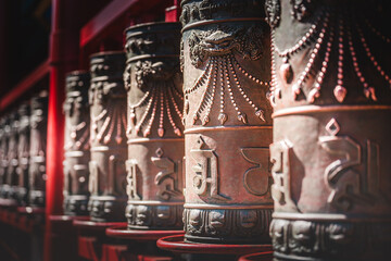 Ornate, dark-red lacquered gates with gilded details frame a courtyard within Beijing's Prince...