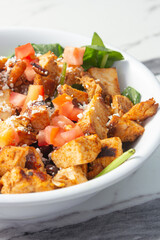 A closeup view of a pollo asado bowl.