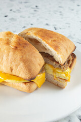 A view of a ciabatta breakfast sandwich.