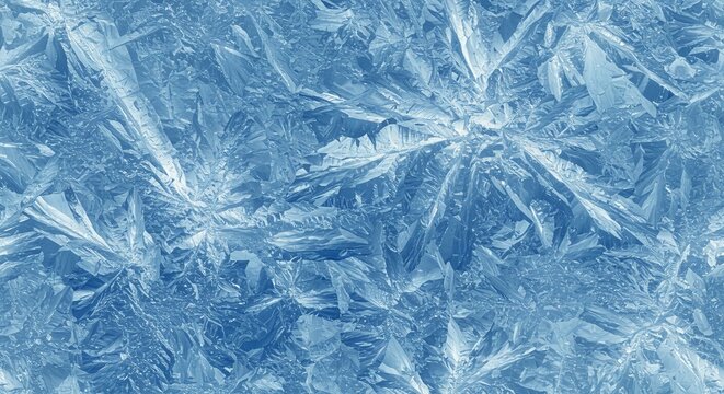 Close-up of intricate ice crystals forming a textured, frosty pattern.