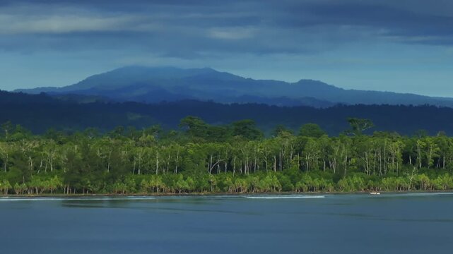Wewak sea harbour view Wewak Hill Cape Wom Dogreto aerial drone Papua New Guinea Pacific Ocean pristine remote tropical beach coastline sunny dry season blue sky morning mountain pass parallax right