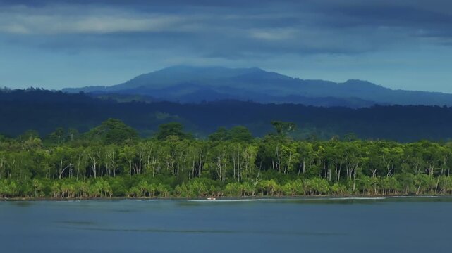 Wewak sea harbour view Wewak Hill Cape Wom Dogreto aerial drone Papua New Guinea Pacific Ocean pristine remote tropical jungle untouched beach coastline sunny dry season blue sky morning upwards