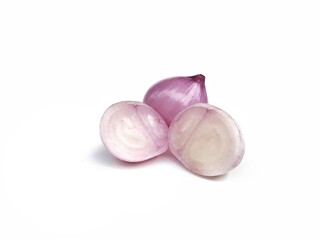 Fresh peeled shallots isolated on white background 
