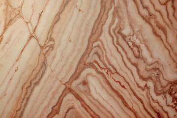 Brown marble texture. Surface natural marble with various shades of brown color veins, background, close-up, high resolution.