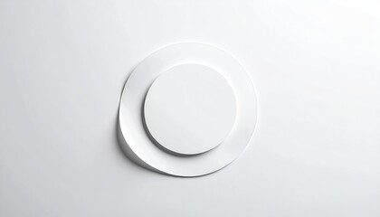 White layered circles, a smaller one centered within a larger, curved ring