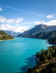 Turquoise lake nestled in mountains