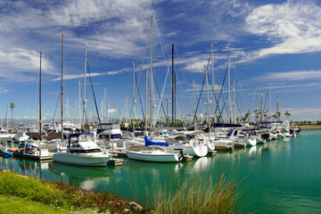 Fototapeta premium Boats Docked at Oxnard Marina on a Sunny Day in California