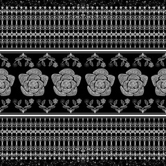 Elegant black and white floral pattern featuring intricate rose designs, perfect for textiles or wallpaper