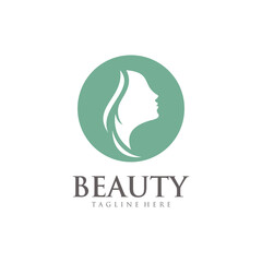 Elegant luxury logo with beautiful face of young adult woman with long hair. Sexy symbol silhouette of girl head and text lettering Beauty, SPA salon