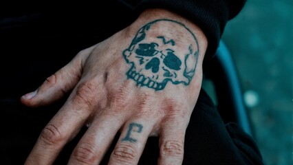 A person's hand with a tattoo. Criminal, gang, tattoos, identity, crime