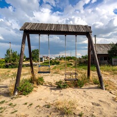Rustic wooden swings in a rural setting