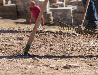 woman with shovel in soil