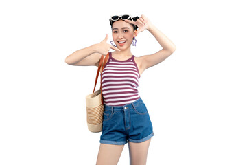 Portrait of a stylish young Asian woman posing with a hand gesture. She is wearing sunglasses, a striped top, and denim shorts, holding a bag on PNG
