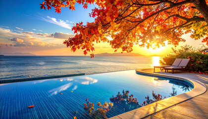 Autumn leaves frame tranquil infinity pool overlooking ocean sunset lounge chairs