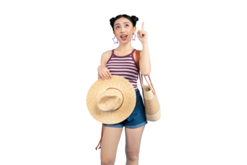 Portrait of a young woman wearing a summer outfit holding a hat and bag and pointing upward with her finger on PNG