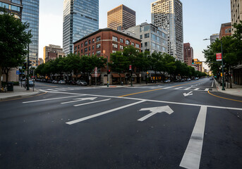 empty city street intersection with modern skyscrapers downtown