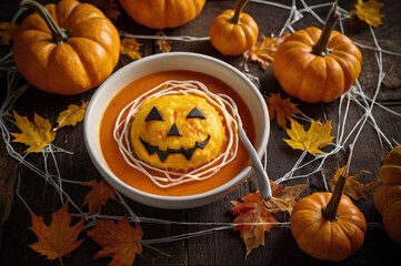 Halloween Pumpkin Soup with Jack-o'- Lantern Garnish food jack-o-lantern